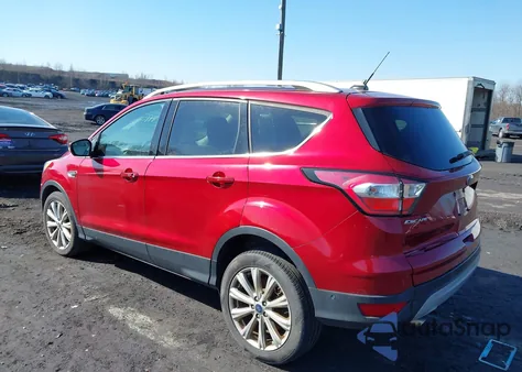 2018 Ford Escape Titanium z USA, uszkodzony, nr VIN 1FMCU0J9XJUB67342
